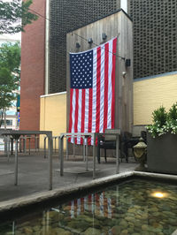 American flag in front of building