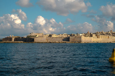 View of fort by sea against sky