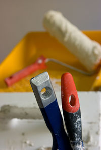 Close-up of paintbrushes on table