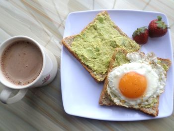 High angle view of breakfast served on table