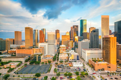 Modern buildings in city against sky