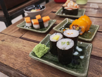 Close-up of sushi served on table