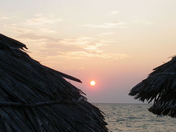 Scenic view of sea against sky at sunset