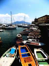 Boats moored at harbor