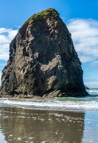 A view of a rock monolith at meyers creek beach in oregon state.