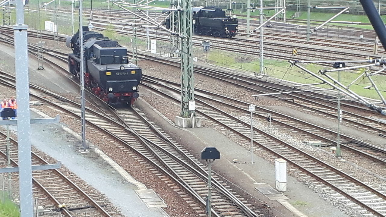 HIGH ANGLE VIEW OF RAILROAD TRACKS AT STATION