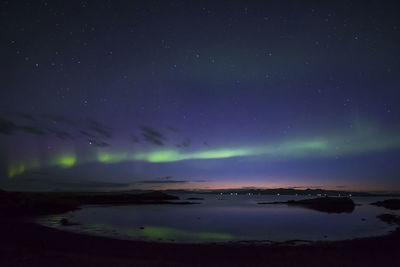 Scenic view of sea against sky at night