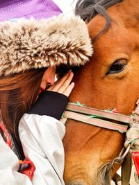 Midsection of man with horse