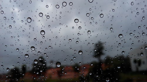 Close-up of water drops on glass