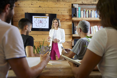 Businesswoman making a presentation in front of her team. good vibes in the office.