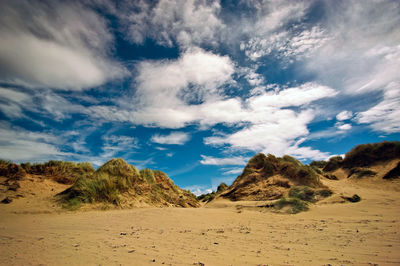 Scenic view of desert against sky