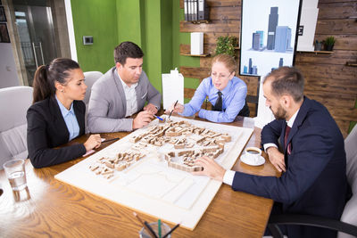 Business colleagues working on table