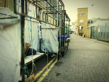 Narrow street along buildings