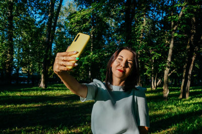 Young woman using mobile phone