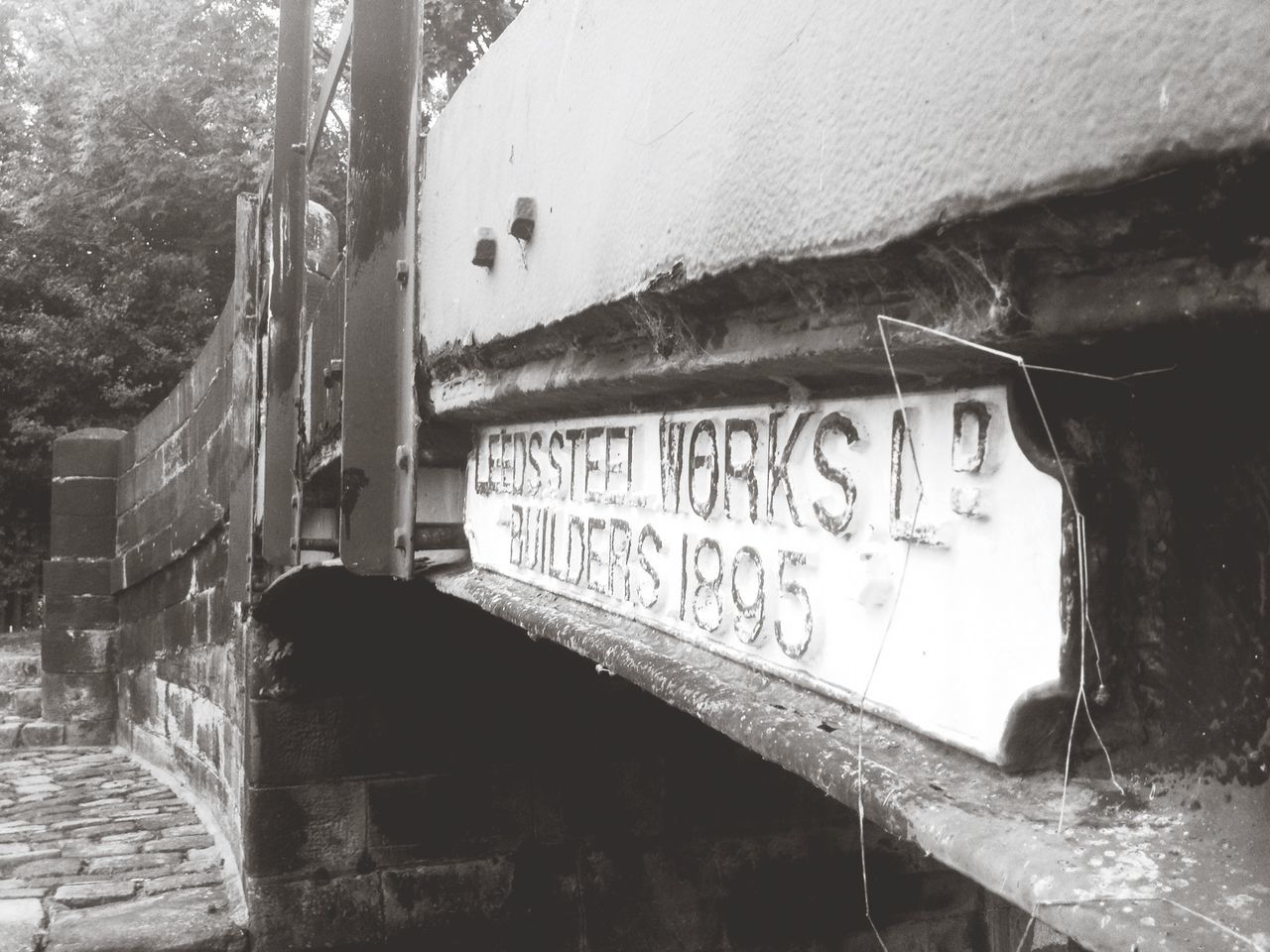 text, western script, graffiti, communication, abandoned, damaged, weathered, wall - building feature, built structure, architecture, obsolete, old, run-down, deterioration, close-up, day, transportation, building exterior, outdoors, capital letter