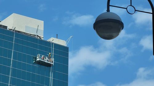 Low angle view of modern building against sky