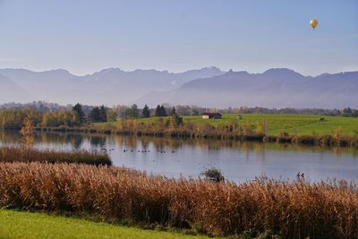 Scenic view of lake against sky