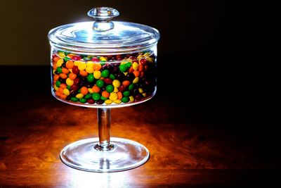 Close-up of multi colored candies on table