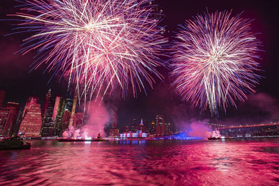 Firework display at night