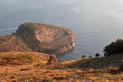 High angle view of rock on sea shore