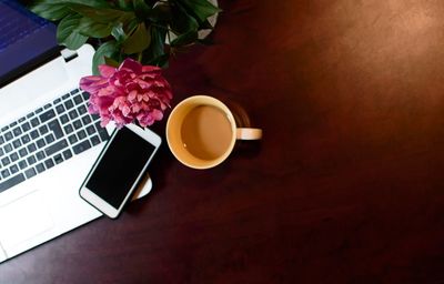 High angle view of coffee cup on table