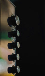 Close-up of wine bottles on table