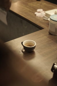 High angle view of coffee cup on table