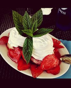 Close-up of strawberries in plate on table