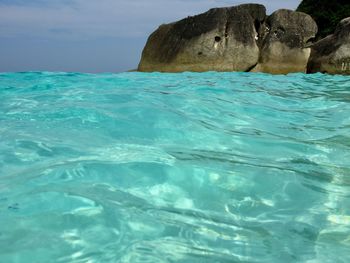 Surface level of swimming pool against sea