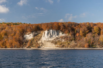 Scenic view of sea against sky during autumn