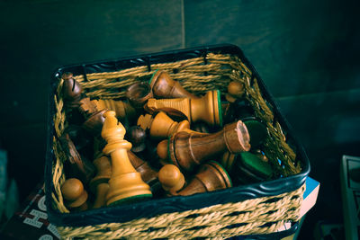 Close-up of chess pieces in basket 