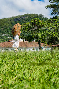 Statue of woman in park