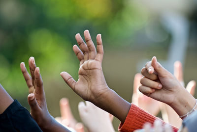 Cropped hands of people