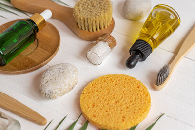 Natural spa cosmetic products, composition with bottles of essential oils, sea salt, sponges