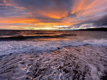 Scenic view of sea against sky during sunset