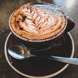 High angle view of cappuccino on table