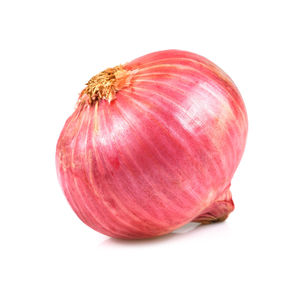 Close-up of red pepper against white background