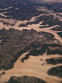 Dry riverbeds, canyons and desert in saudi arabia taken from an aircraft.