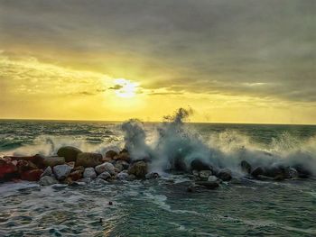 Scenic view of sea against sky during sunset