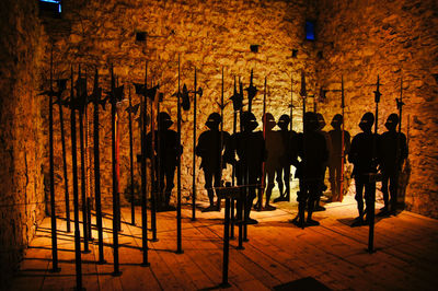 Men standing in corridor