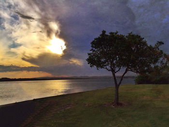 Scenic view of sea against cloudy sky