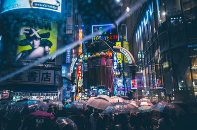 Crowd in city at night