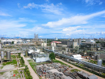 Plant petrochemical in the daytime with copy space on top.