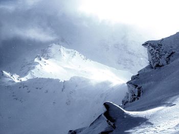 Scenic view of snow covered mountains