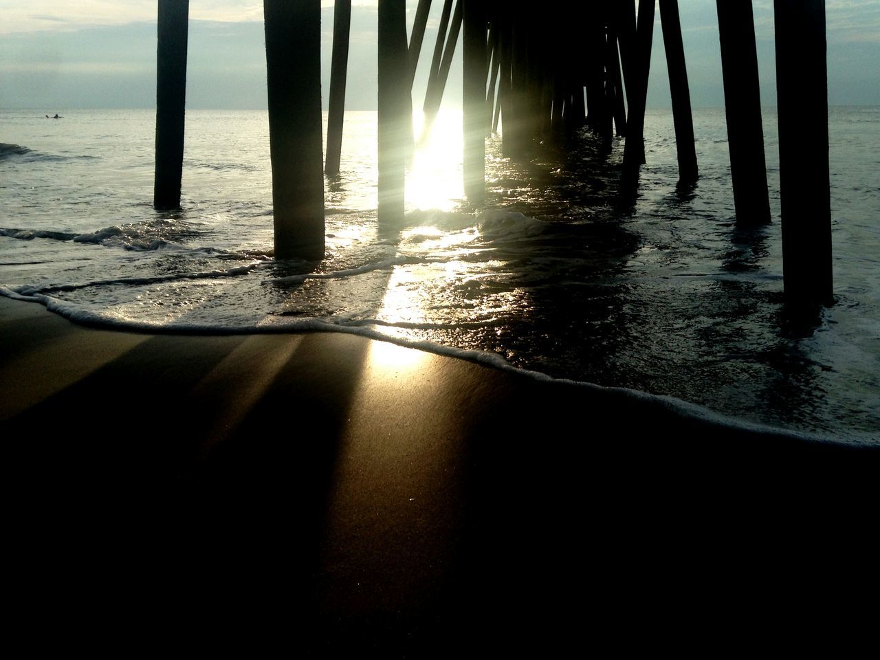 sea, sun, water, beach, sunlight, sunset, horizon over water, silhouette, shore, sunbeam, reflection, tranquility, tranquil scene, scenics, beauty in nature, nature, sand, lens flare, sky, shadow