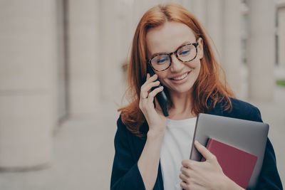 Young woman using mobile phone