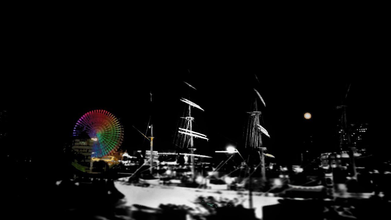 ILLUMINATED CAROUSEL AT AMUSEMENT PARK