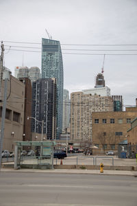 Buildings in city against sky