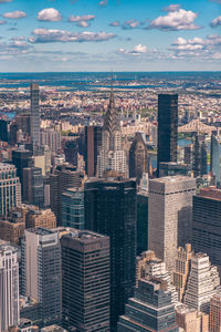 Aerial view of cityscape against sky