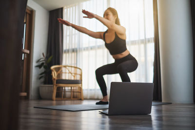 Woman exercising at gym